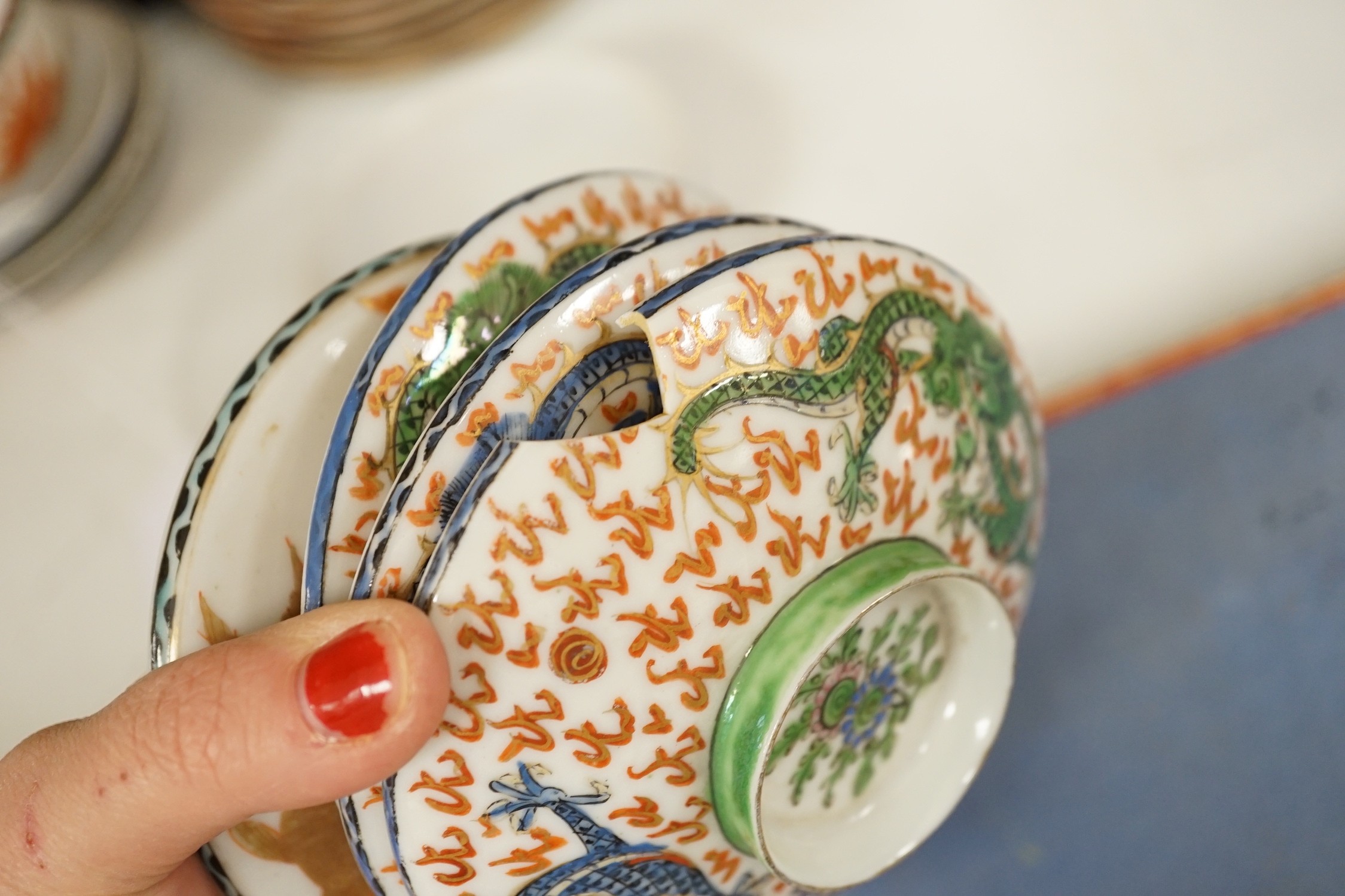 A Gien pottery jug, a Chinese crackle glaze baluster vase, egg-shell tableware and three Oriental wood stands